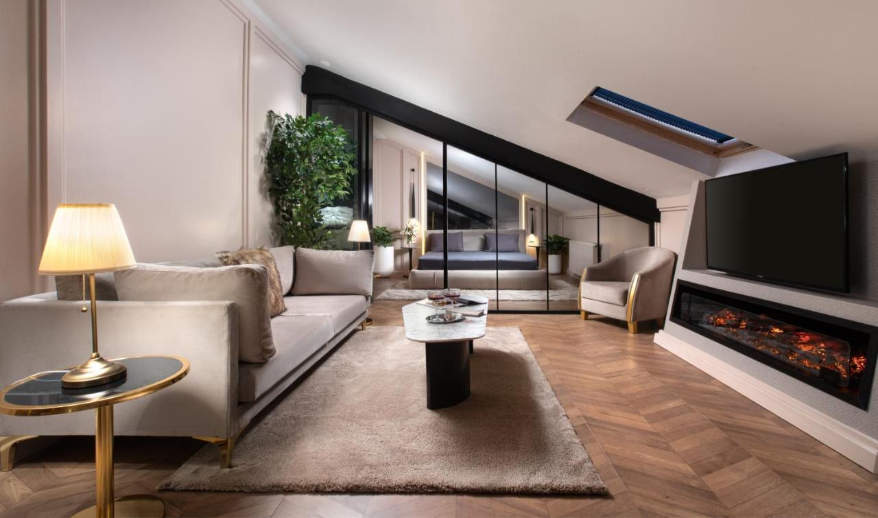 Suite Penthouse Exécutive avec Cheminée et Baignoire